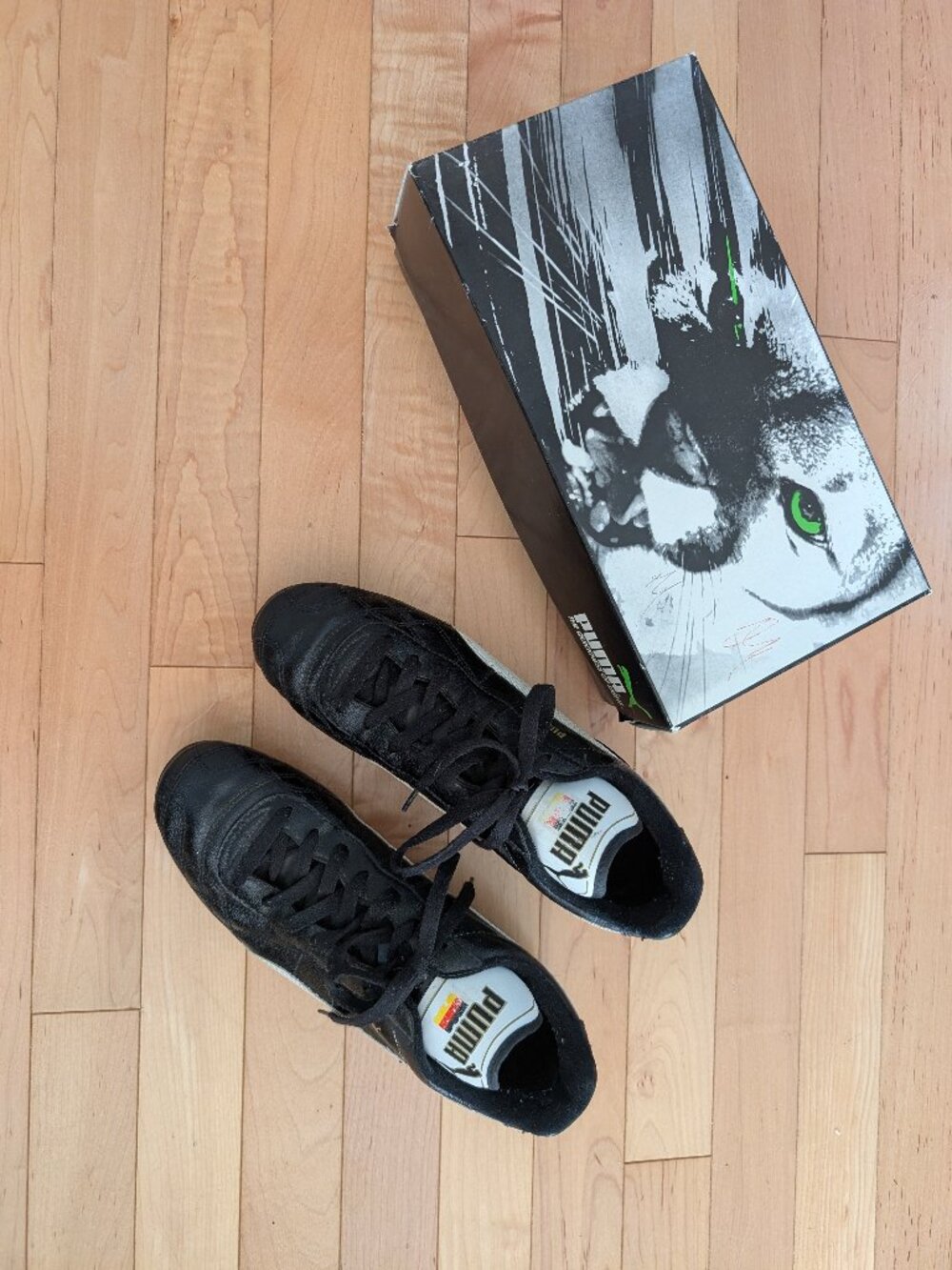 Men's Puma Black and White Blast Soccer Shoes - Size 7.5